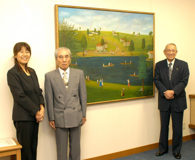 加名田義一さん自作の油絵「ロードレース」を市に寄贈の画像